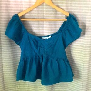 Deep turquoise slightly cropped flutter blouse